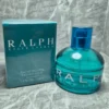Perfume original Ralph Lauren Ralph para mujer en frasco turquesa redondo y caja original azul.