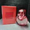 Perfume original Bvlgari Omnia Coral para mujer en frasco de anillos entrelazados rojo coral y caja original.