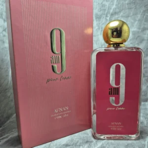 Perfume árabe Afnan 9 AM Pour Femme para mujer en frasco rosado con tapa dorada y caja original.