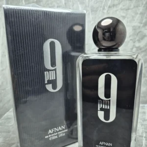Perfume árabe Afnan 9 PM para hombre en frasco negro elegante con el número 9 y caja original.