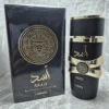 Perfume árabe Lattafa Asad para hombre en frasco negro con detalles dorados y caja original.