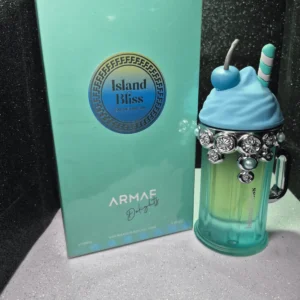 Perfume Armaf Island Bliss para mujer en frasco con diseño de batido azul y caja original.