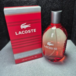 Perfume original Lacoste Red Style in Play para hombre en frasco rojo ovalado con caja original.