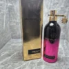 Perfume original Montale Starry Nights en envase de aluminio con degradado negro a fucsia y caja dorada original.