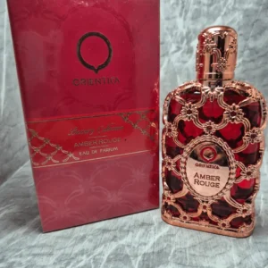 Perfume árabe Orientica Amber Rouge unisex en frasco rojo con diseño de malla dorada y caja original de lujo.