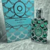 Perfume árabe Orientica Azure Fantasy unisex en frasco azul turquesa con malla plateada y caja original de lujo.