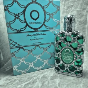 Perfume árabe Orientica Azure Fantasy unisex en frasco azul turquesa con malla plateada y caja original de lujo.
