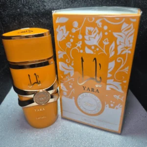 Perfume árabe Yara Tous Lattafa para mujer en frasco naranja vibrante con caja original decorada.