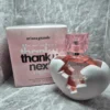 Perfume original Ariana Grande Thank U Next para mujer en frasco de corazón roto blanco y rosa con caja original.