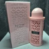 Perfume árabe Rave Now Women para mujer en frasco rosado con textura geométrica y caja.