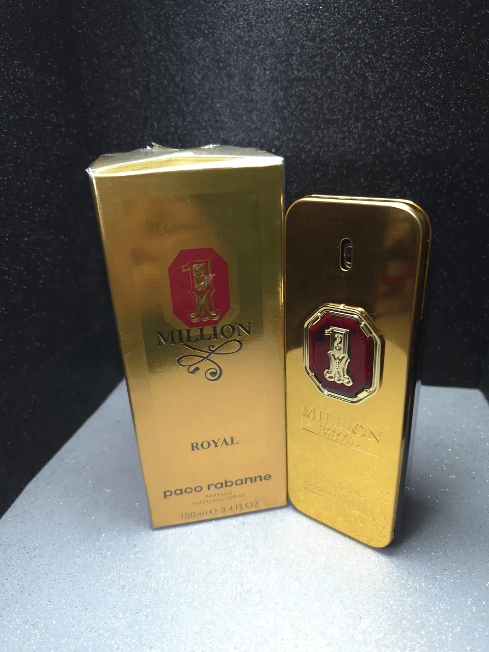 Perfume original Paco Rabanne 1 Million Royal para hombre en frasco de lingote de oro con escudo de corona roja y caja original.