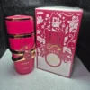 Perfume árabe Yara Candy Lattafa para mujer en frasco fucsia vibrante con caja decorada.